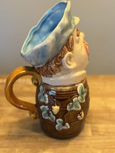 MAJOLICA STYLE PORCELAIN PLANTER VASE MAN IN BARREL W/ GRAPE VINES 10”