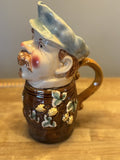 MAJOLICA STYLE PORCELAIN PLANTER VASE MAN IN BARREL W/ GRAPE VINES 10”