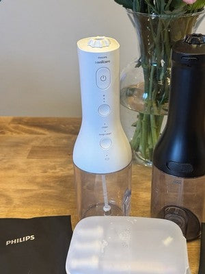 Philips Sonicare Cordless Power Flosser Duo White Black + New Heads Excellent